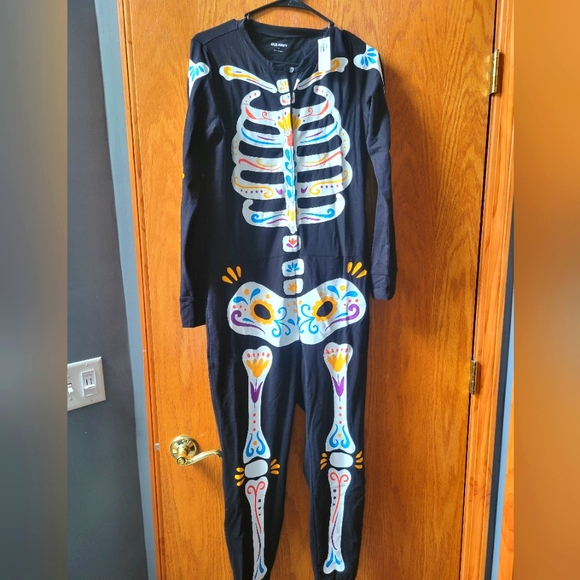 Pants - NWT women's size medium one piece skeleton outfit.